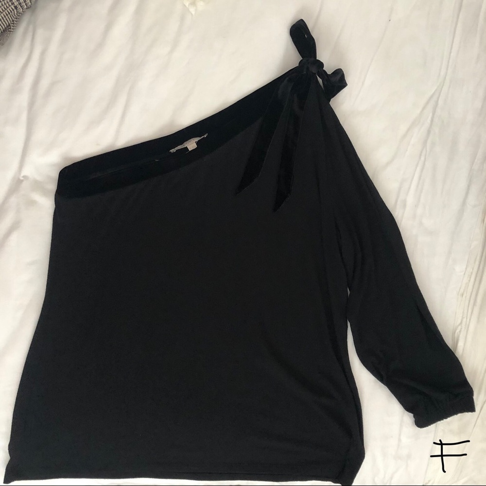 One shoulder black top with velvet bow